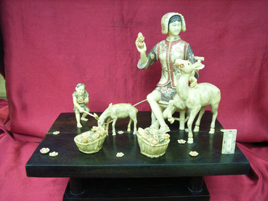 kkm3218 Mammoth Ivory Carving Village Girl & Deer 7.5"