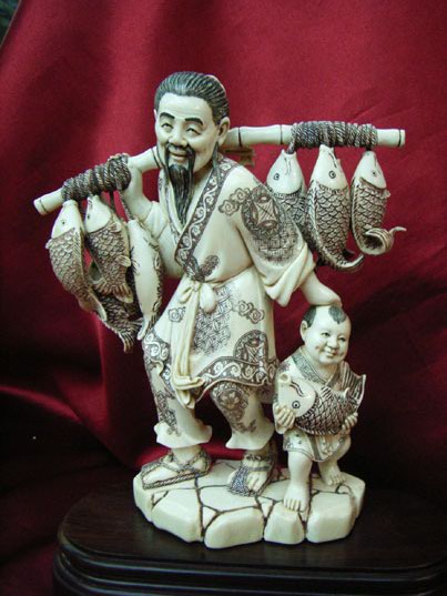 kkm3273 Mammoth Ivory Carving Fisherman Kid 6.5"