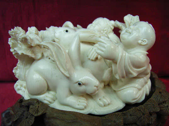 kkm3458 Mammoth Ivory Carving Boy & Girl Feed Rabbit
